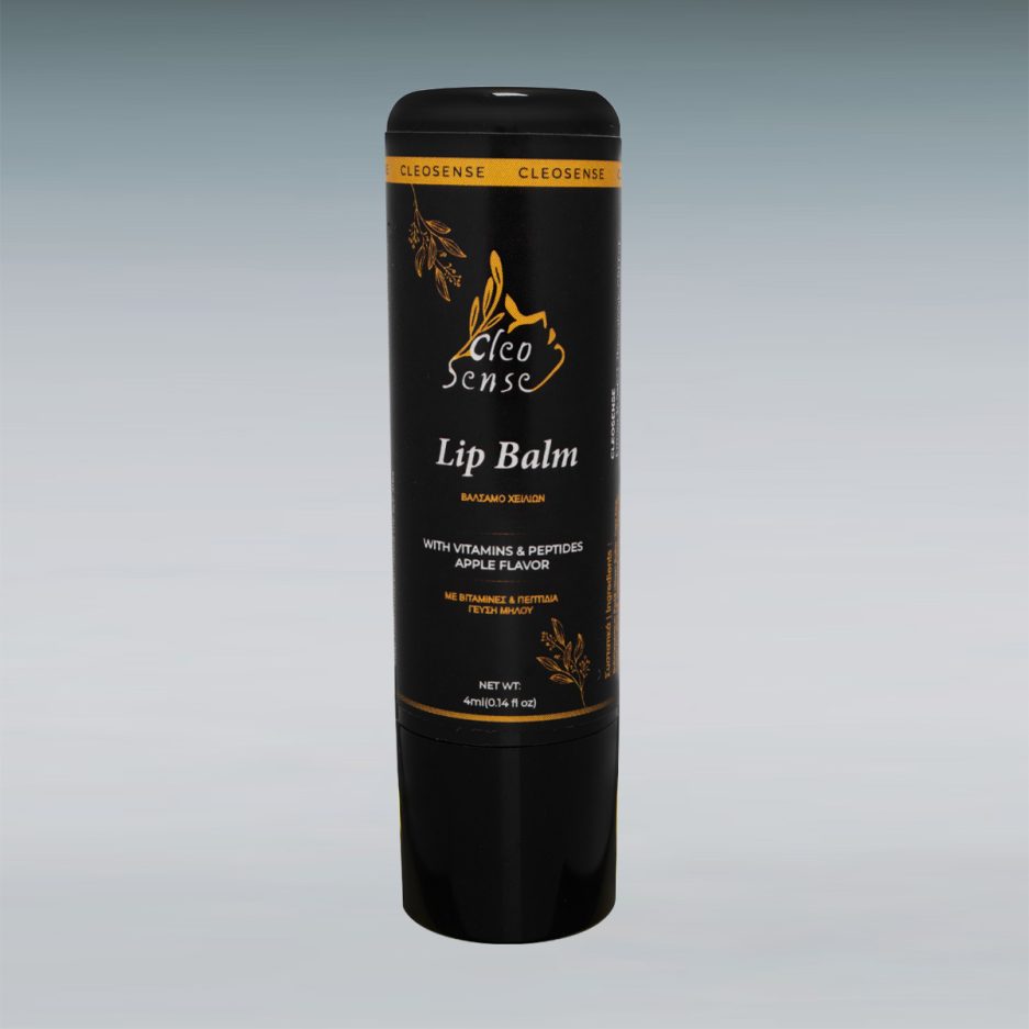 a black and gold tube of lip balm